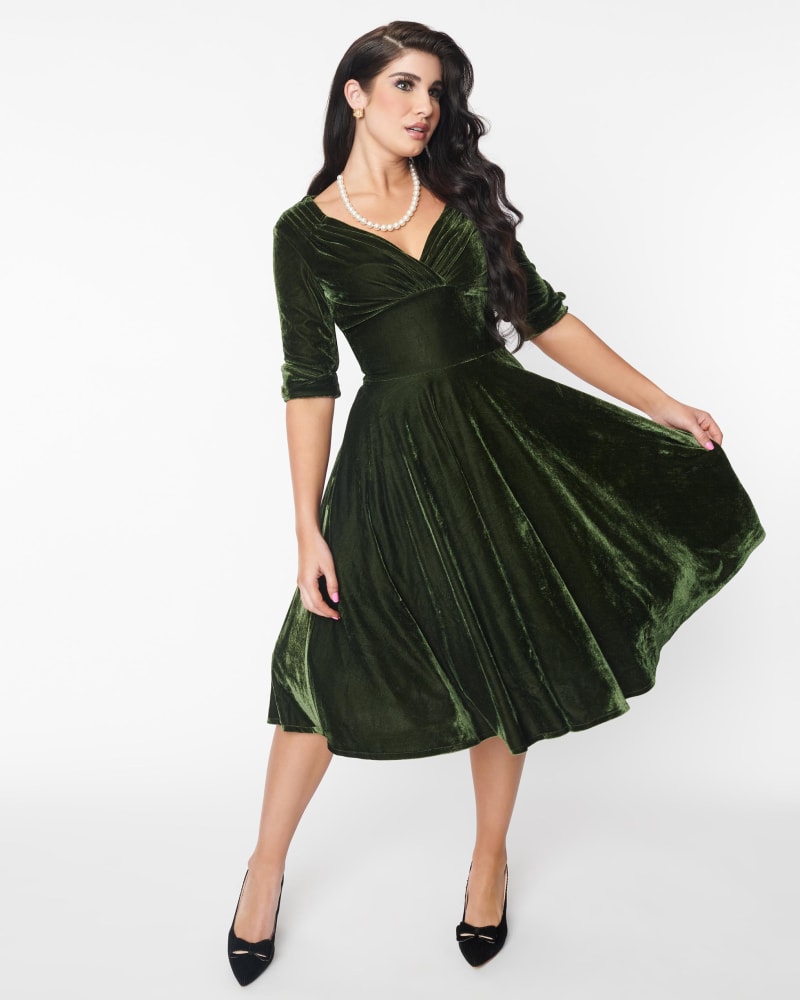 Front of a model wearing a size 3X Unique Vintage Olive Green Velvet Delores Swing Dress in Olive Green by Unique Vintage. | dia_product_style_image_id:317001